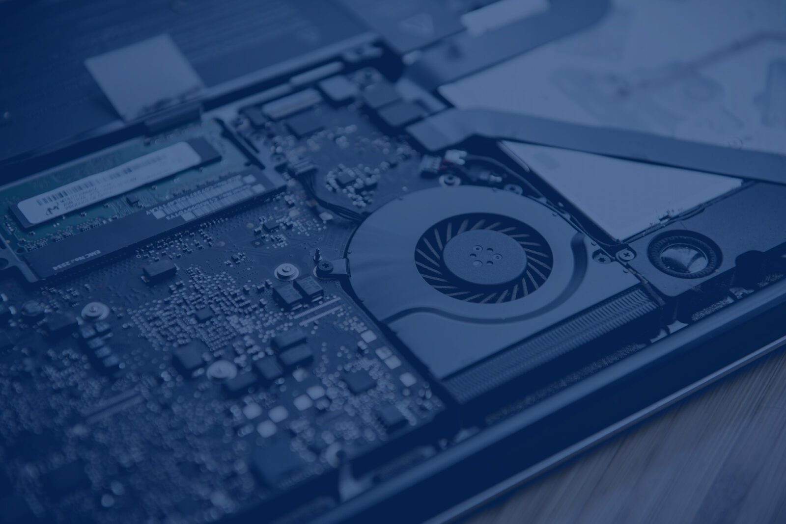 A close-up photo of a laptop cooling system board