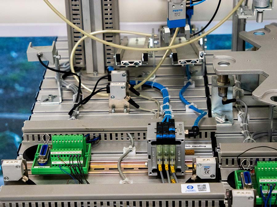 Machine with wires and electronics with finished surfaces
