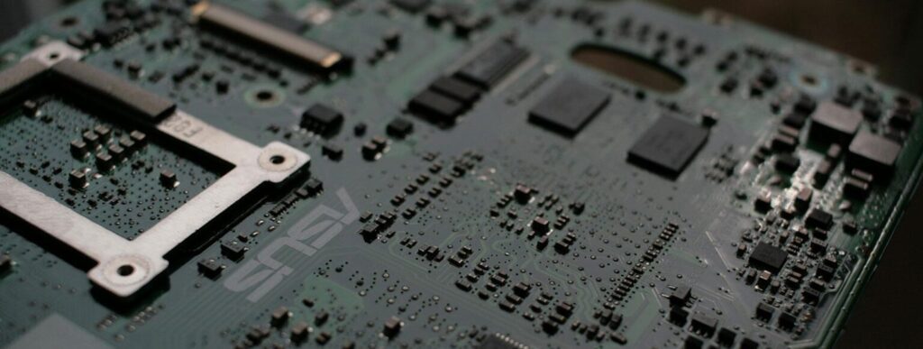 Close-up of a black circuit board of a computer.