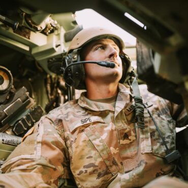 Soldier operating military equipment.