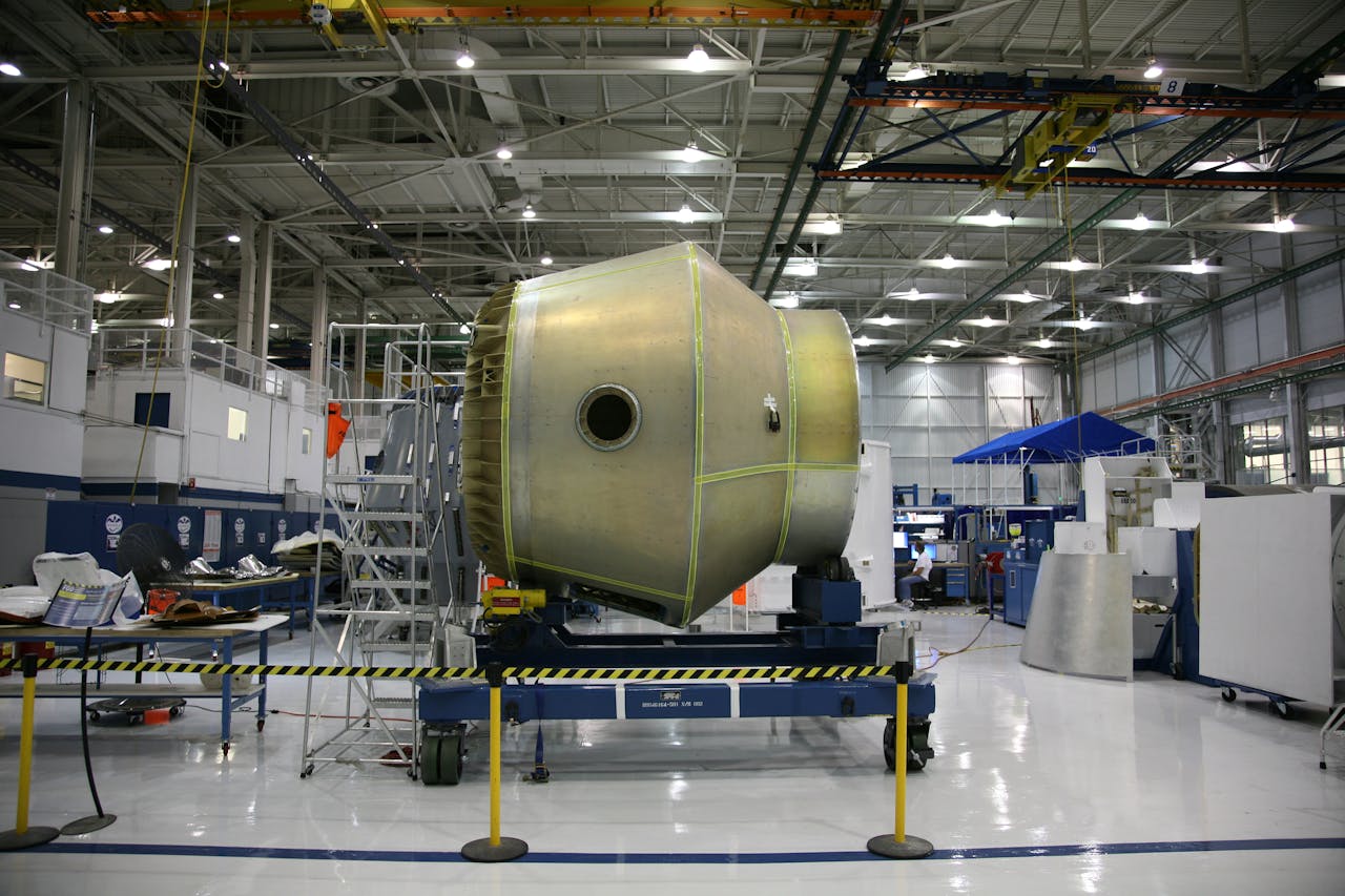 Large aerospace component positioned in a controlled manufacturing facility